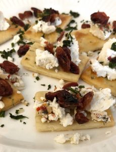 These simple basil and cranberry goat cheese appetizers are perfect for Thanksgiving!