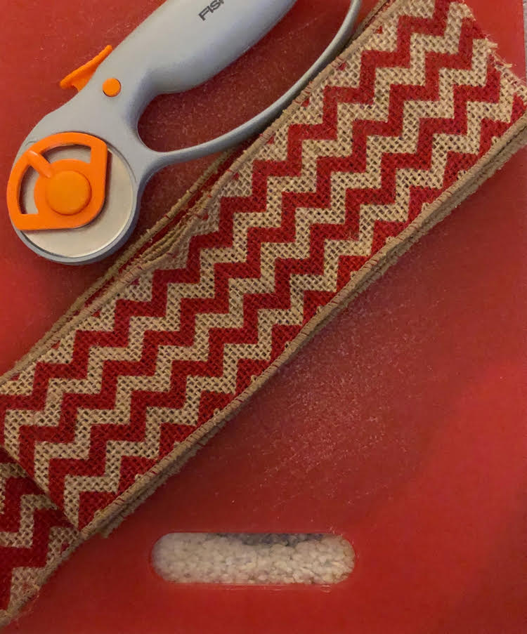 Cutting burlap for a wreath bow