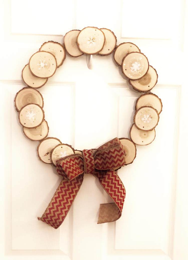 Rustic stenciled wood slice wreath