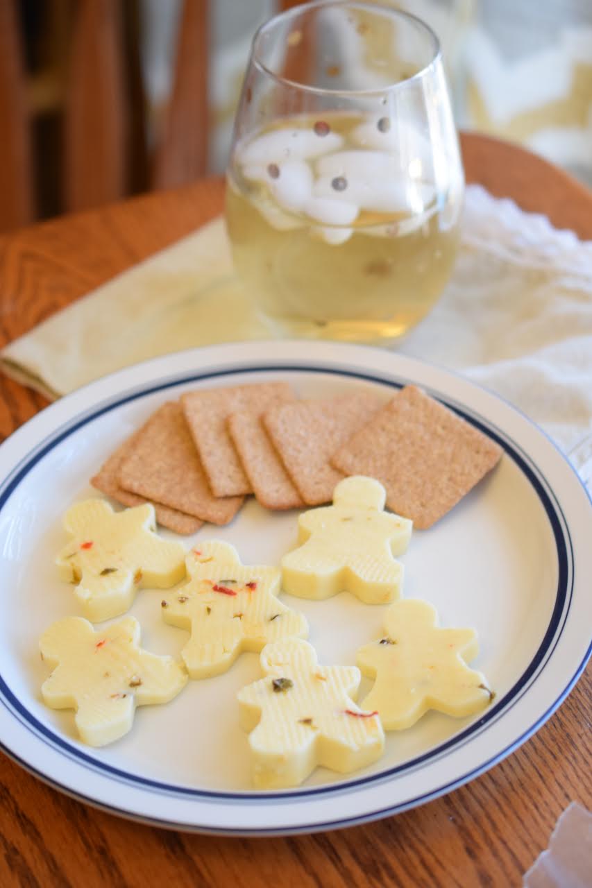 A platter of Cabot pepper jack cheese and crackers for Christmas. I used gingerbread men cookie cutters to cut the cheese.