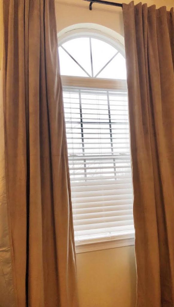 The velvet Therapedic® Carlisle 100% Blackout Rod Pocket Window Curtain Panels are beautiful and blissfully darken a bedroom for sleep. (Available at Bed, Bath & Beyond)