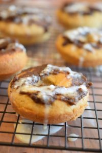 This quick and easy recipe for cinnamon roll donuts is perfect for Christmas morning and the holidays.