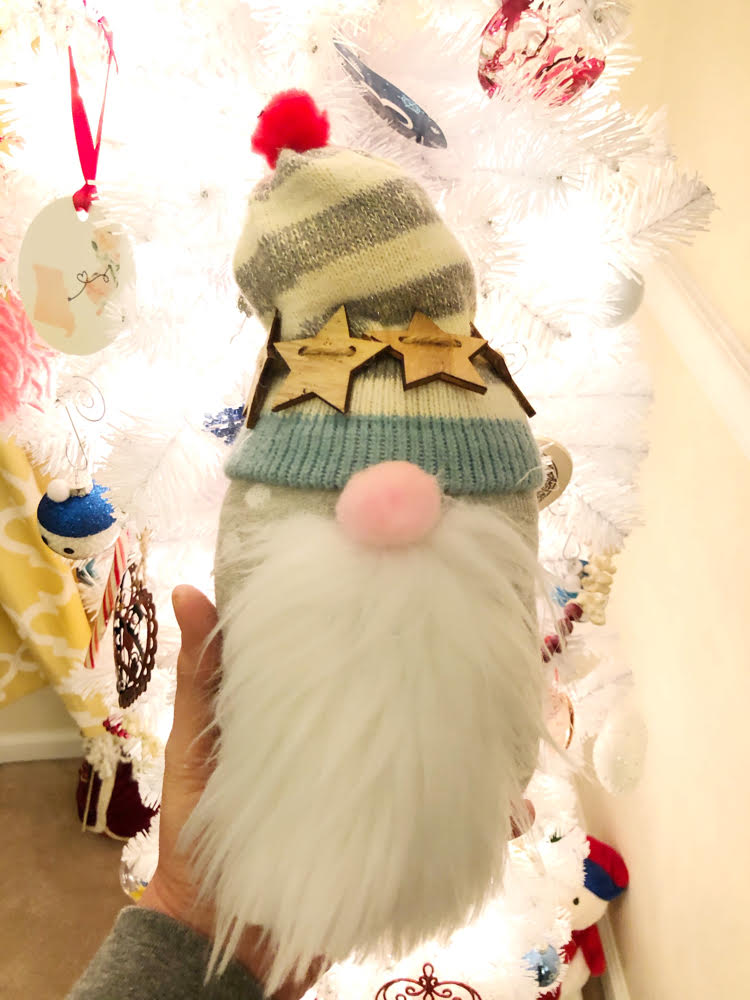 A cute sock gnome made with socks -- these gnomes are no sew and can be made in minutes!