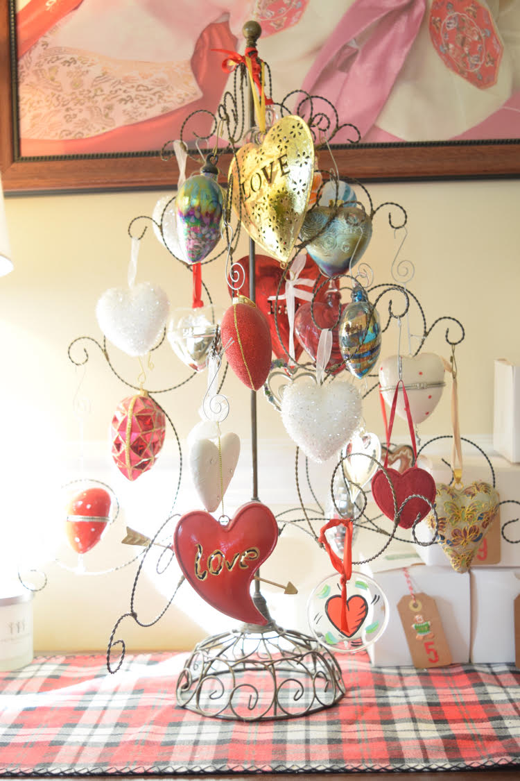 My husband gives me heart ornaments every year. Most of them are on this ornament tree. Sometimes I keep it up all year! Plus, stop by the blog t o see several of my blogging friends' Christmas trees!