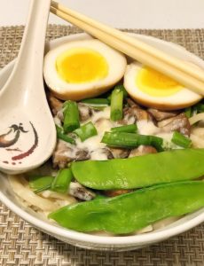 I love this easy and delicious recipe for mushroom udon soup with a cheesy Swiss cheese sauce and a soy egg.