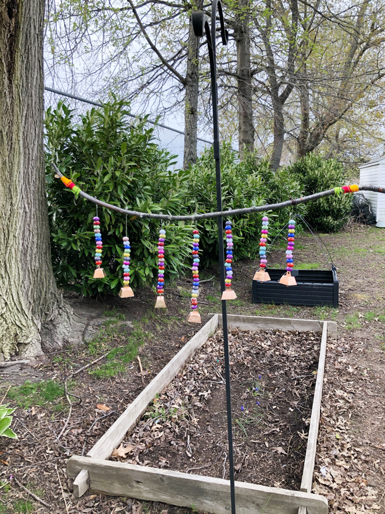 This colorful beaded wind chime is easy to make with materials you can ind at home