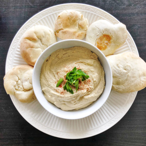 It's easy to make delicious homemade pita bread and hummus at home.