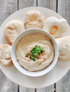 It's easy to make delicious homemade pita bread and hummus at home.