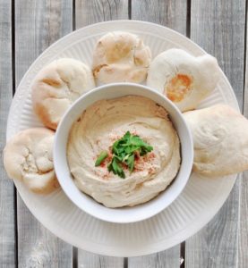 It's easy to make delicious homemade pita bread and hummus at home.