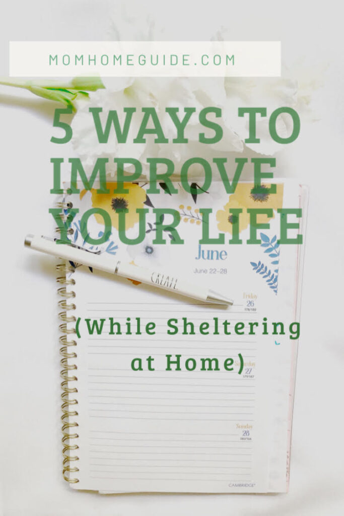 A date book and pen on a date book with the text, 5 Ways to Improve Your Life (While Sheltering at Home)