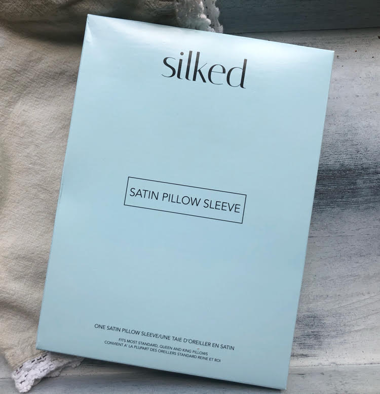 A box holding a Silked Satin Pillow Sleeve.