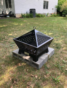 Landmann fire pit with mesh cover