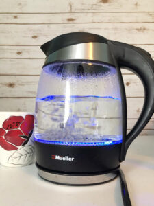 blue lit electric tea kettle