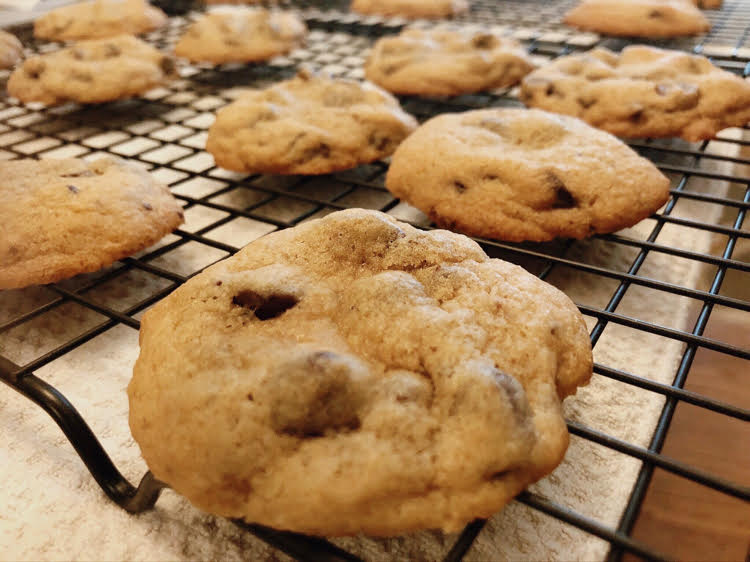 chocolate chip cookies on a baking rack