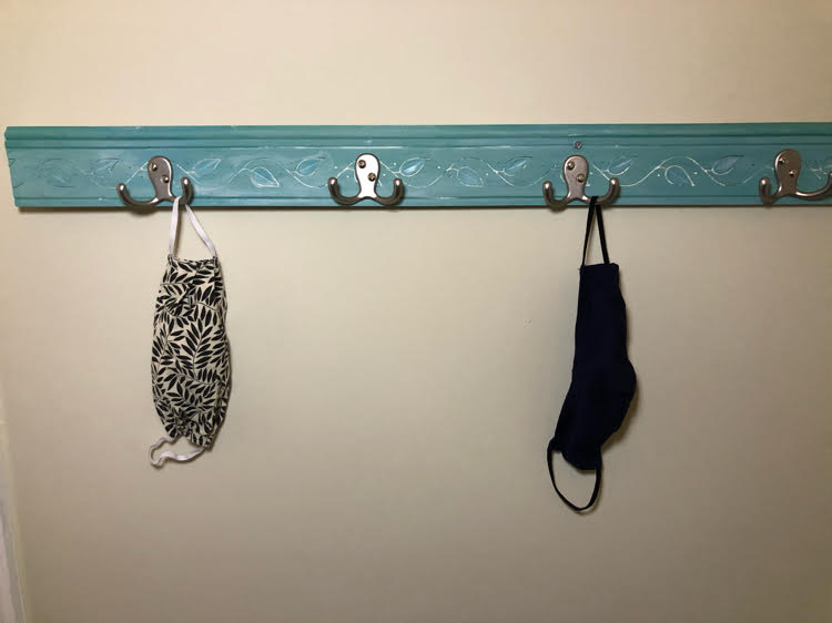 a blue-green DIY face mask rack