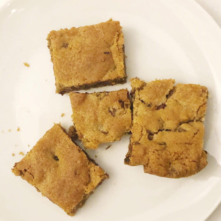 4 chocolate chip cookie bar cookies on a white plate