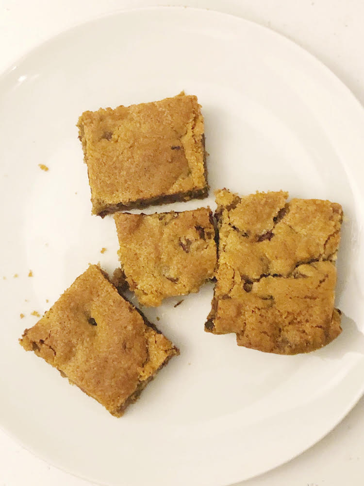 4 chocolate chip cookie bar cookies on a white plate