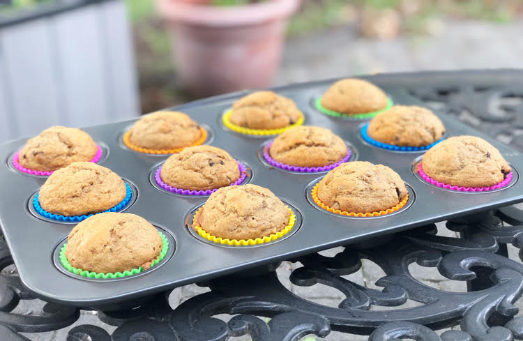 muffins in colorful silicone cupcake liners in a muffin tin