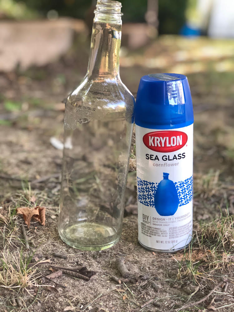 clear wine bottle and can of Krylon Sea Glass semi translucent spray paint in sea glass