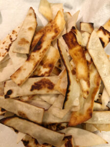 a plate of homemade fried tortilla strips