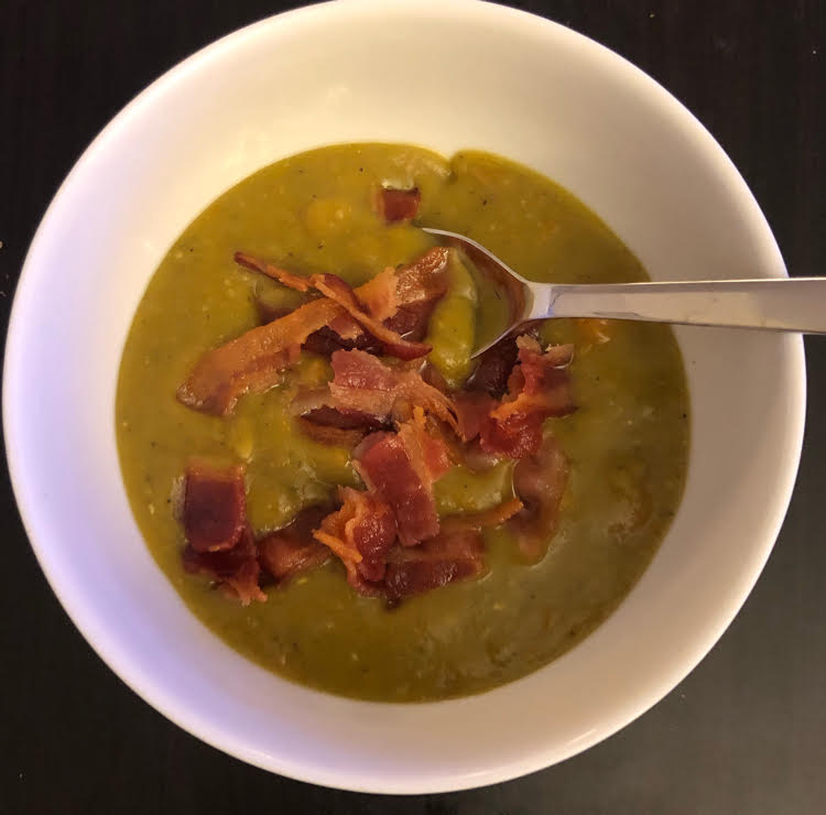 split pea soup topped with bacon
