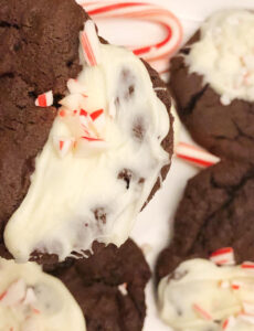 chocolate cookies iced with white chocolate and topped with crushed peppermint candy canes