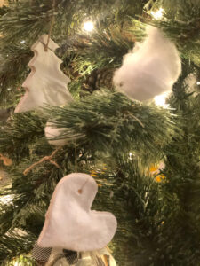 homemade Christmas tree and heart salt dough ornaments on a Christmas tree