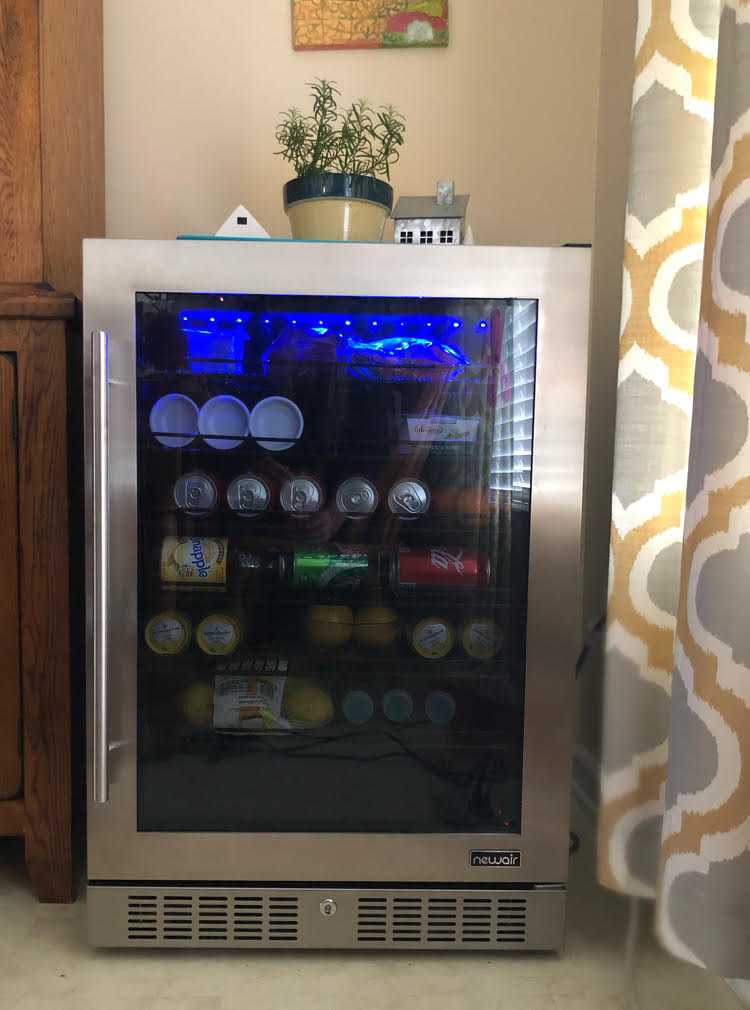 modern beverage fridge with LED lights