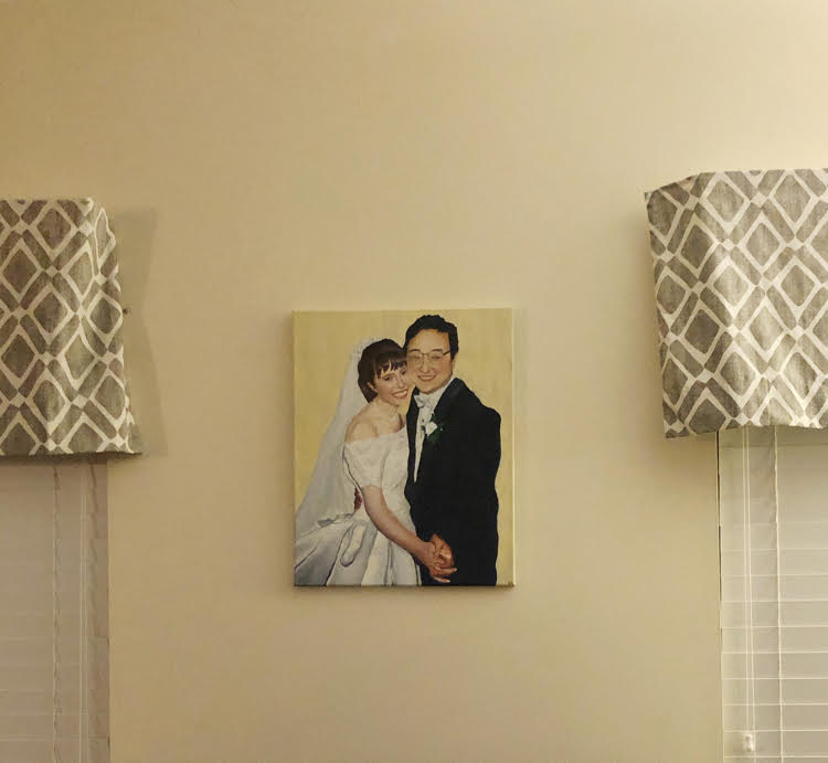 painted wedding portrait on a wall