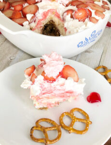 I love this simple but incredibly good pink strawberry cheesecake pie with a pretzel crust. It's perfect for Valentine's Day!