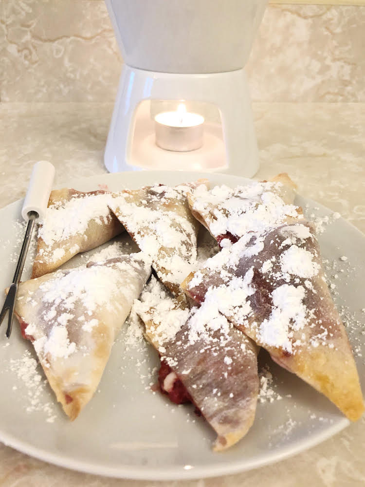 Chocolate fondue with strawberry cream cheese air fried won tons