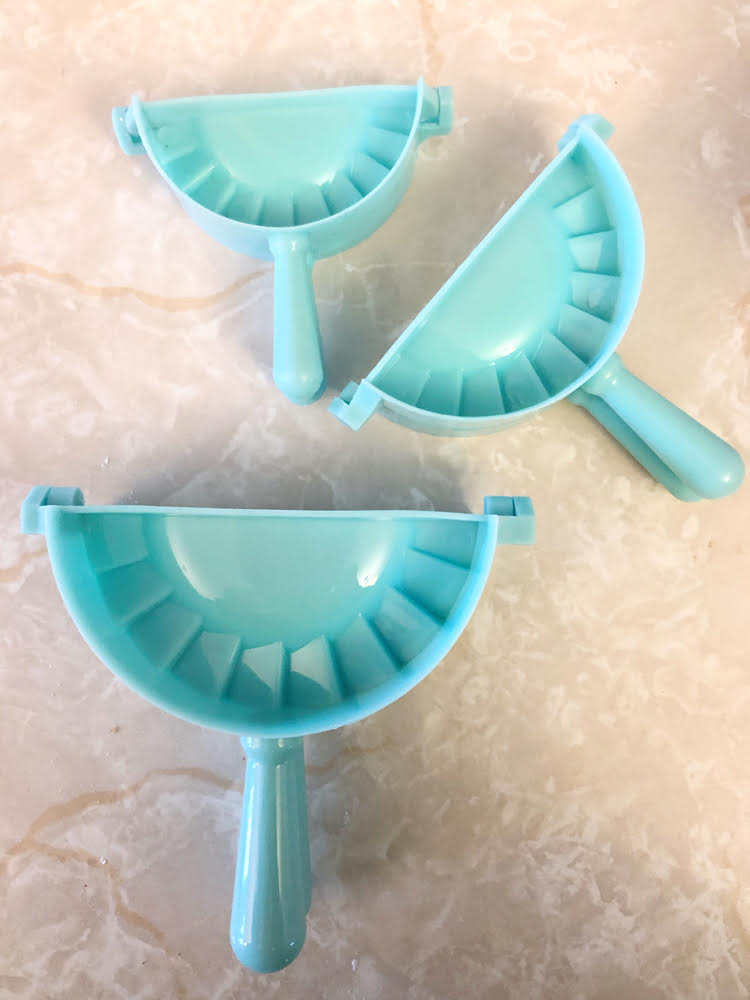 I love this pretty blue dumpling maker set with three differently sized dumpling and ravioli crimpers.
