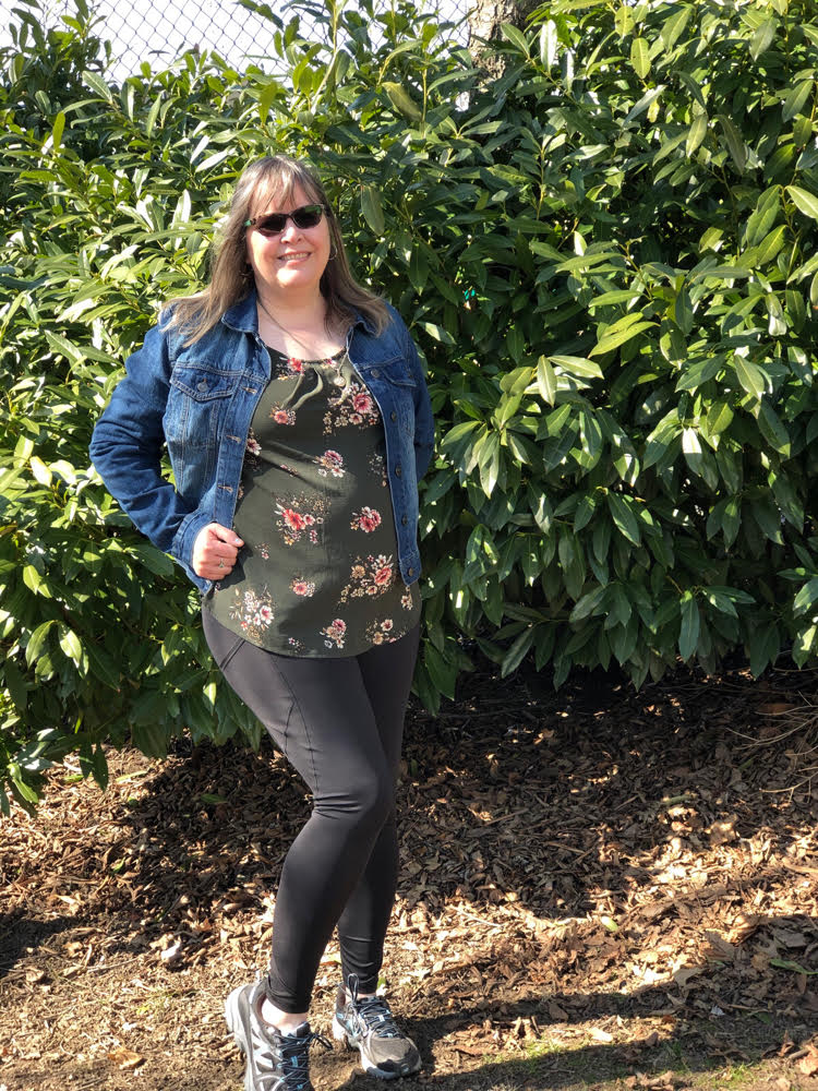 Royalty denim jacket with a floral top and black tights