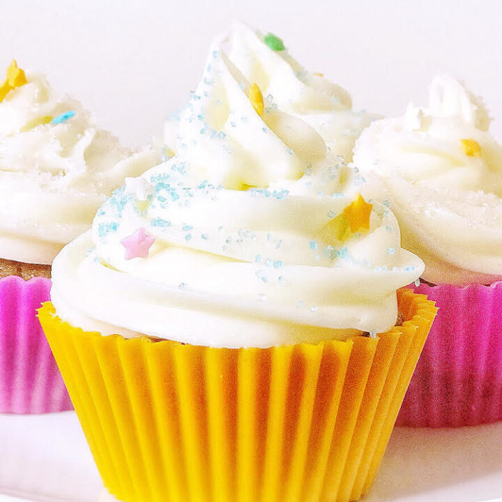 carrot cupcakes with cream cheese icing in pretty silicone reusable cupcake liners