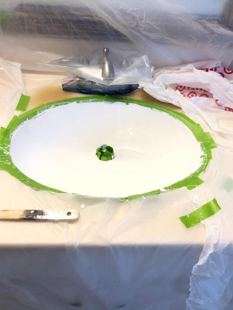 This yellow cultured marble sink has been refinished to a beautiful bright white with Ekopel