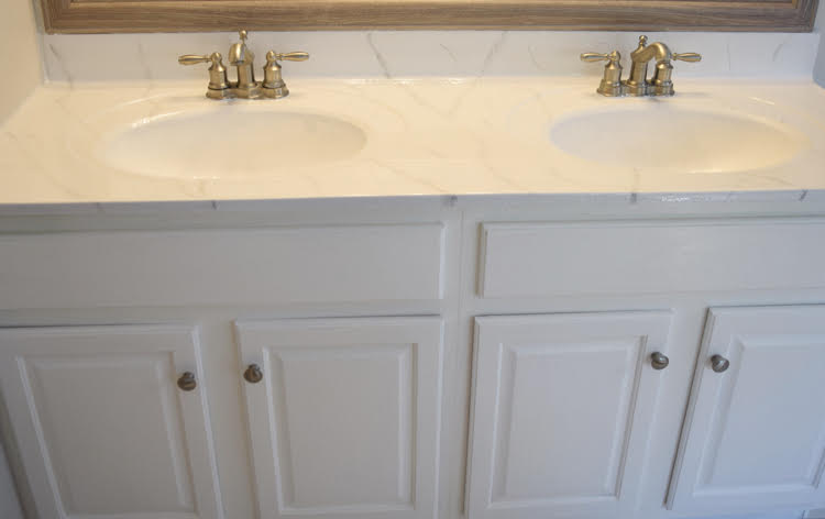 painted white vanity with diy marble epoxy counters