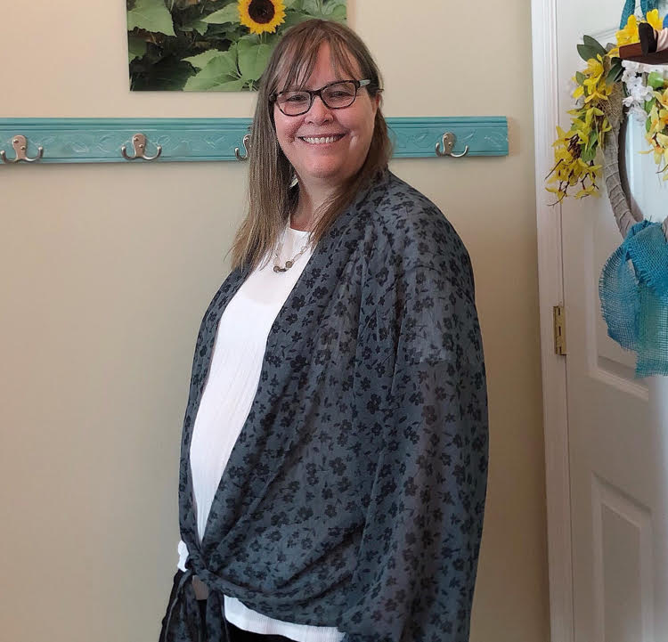 white blouse with a blue and black floral kimono