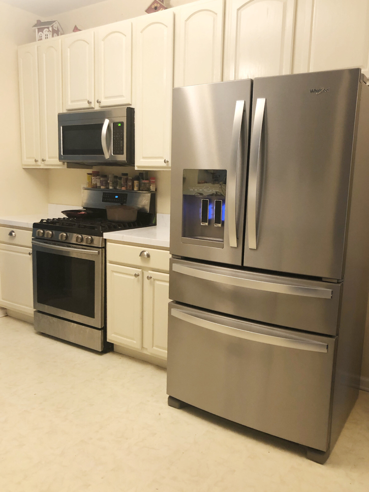 kitchen with painted cabinets and counters