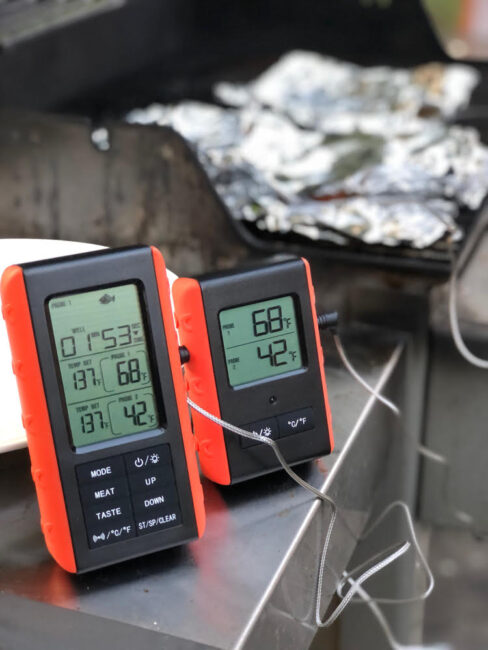 remote grill thermometer set to fish for cooking on the grill