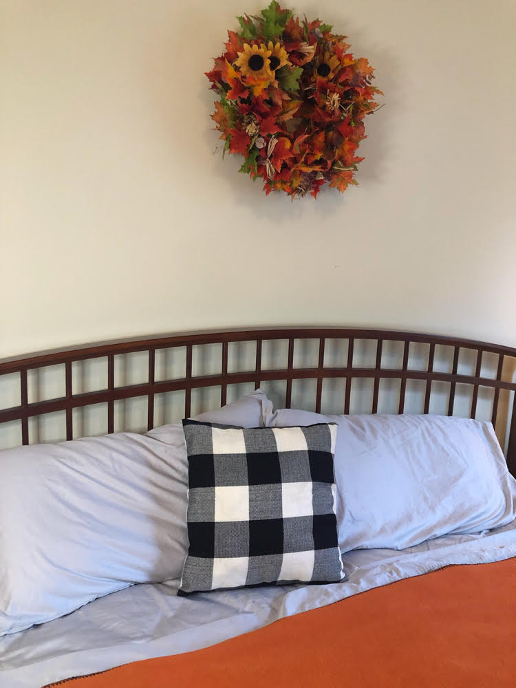 I love this cozy orange, black and gray Autumn bedroom