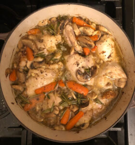 chicken braised in beer with mushrooms, carrots and thyme
