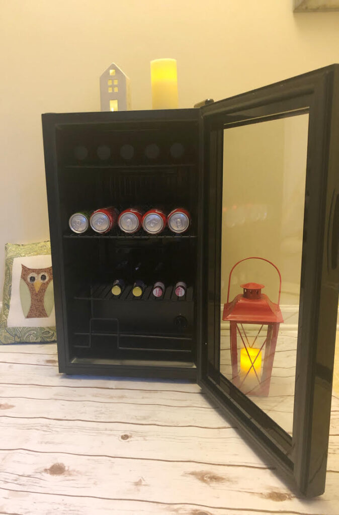 The NewAir 20th Anniversary Limited Edition Beverage Fridge has a dual pane glass door, enough room for 100 cans, and can cool drinks to 37 degrees.