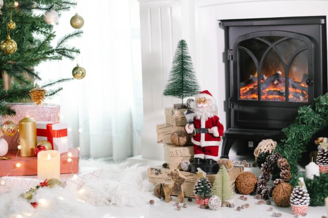 Decorated Christmas tree and fireplace