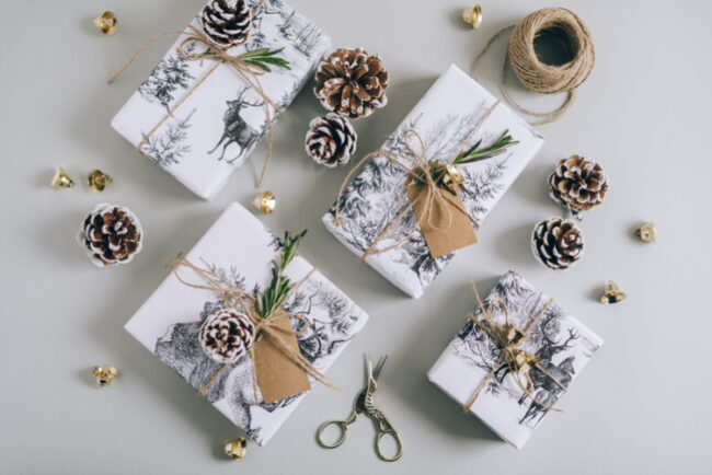 gifts decorated with evergreen twigs