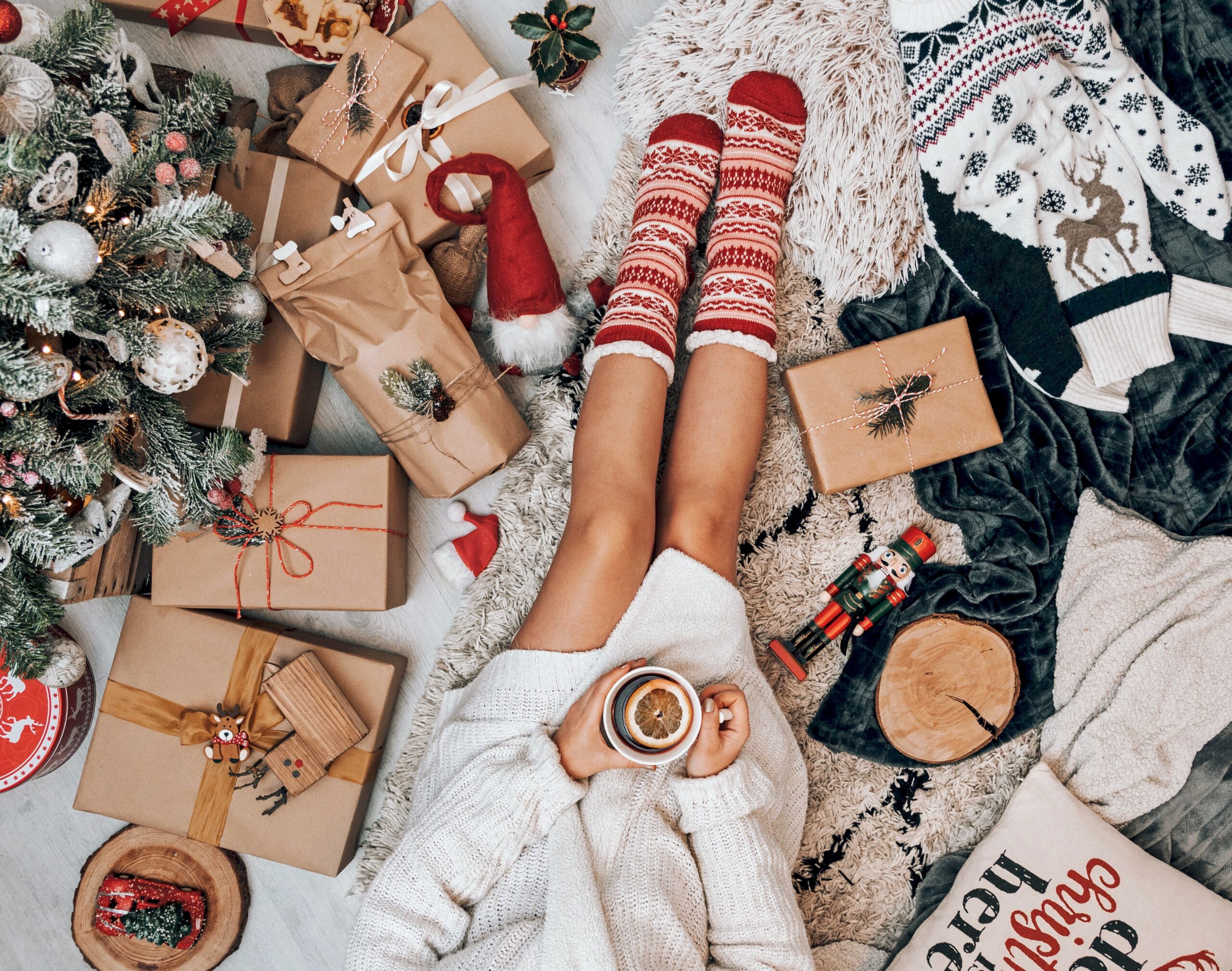 woman wrapping Christmas gifts