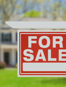 for sale sign in front of a home