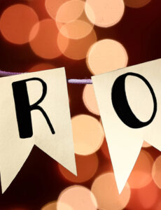 prom banner with blurred lights behind it