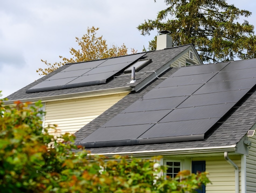 black solar panels installed on residential home roof