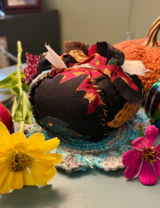 a collection of decorative pumpkins on a table