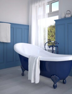 blue and white bathroom with a beautiful tub